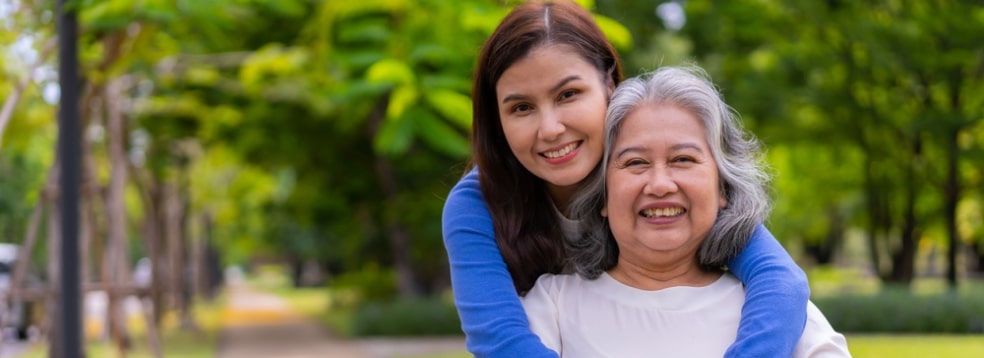 Elderly lady with her caregiver